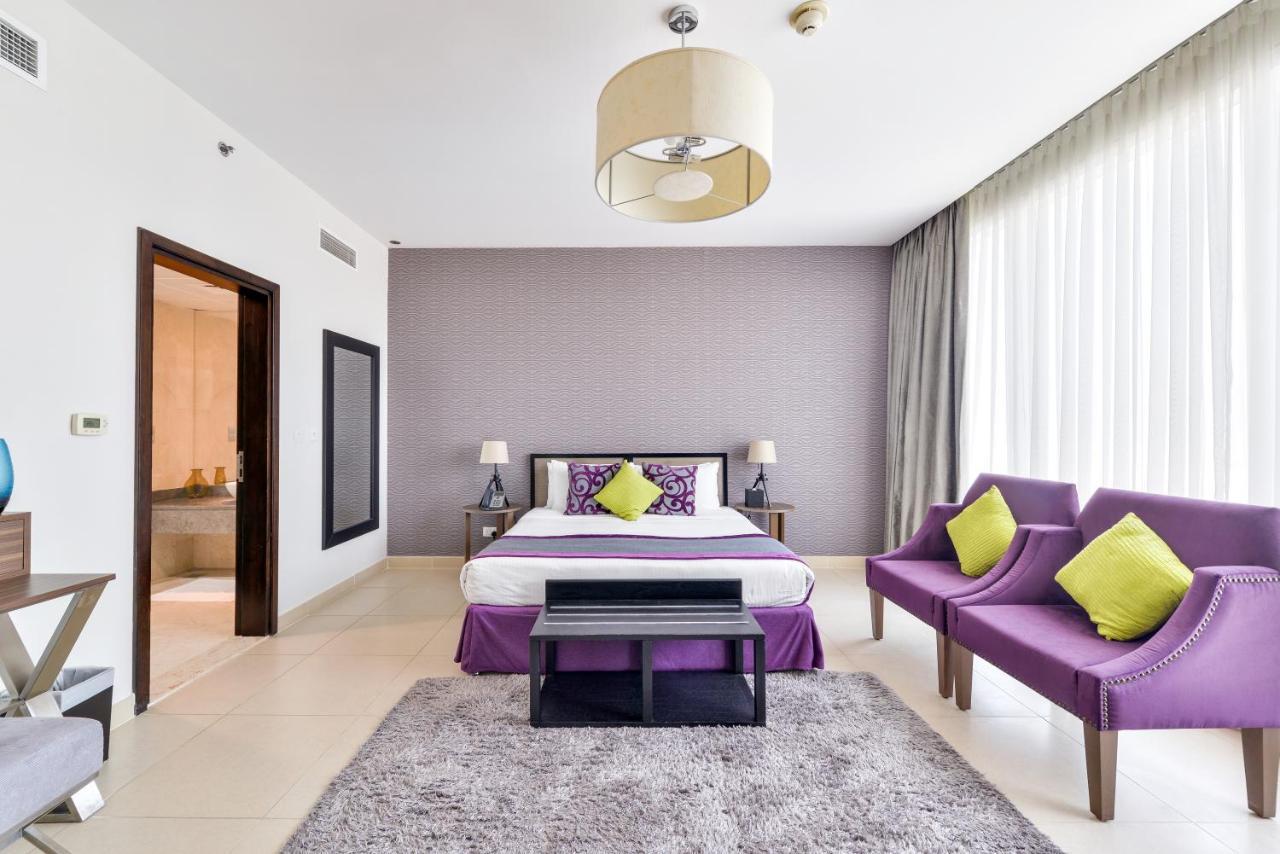 Nassima Tower Hotel Apartments Dubai Exterior foto A bedroom at the hotel