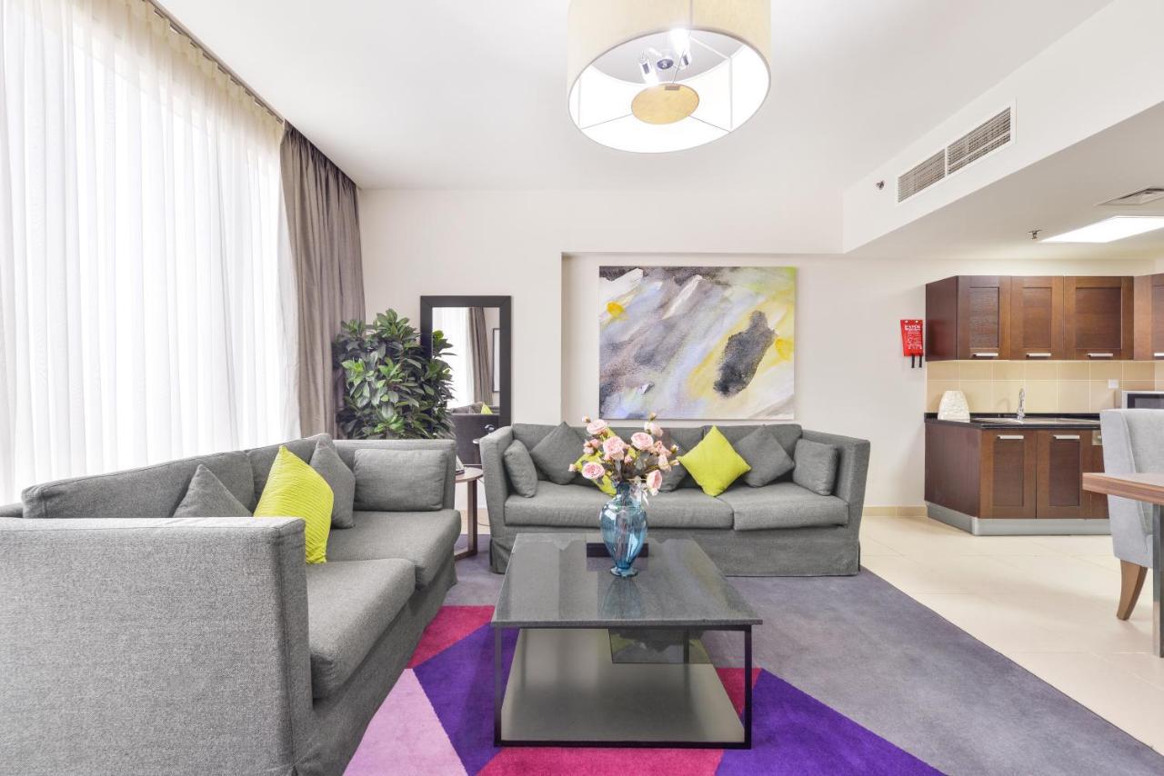 Nassima Tower Hotel Apartments Dubai Exterior foto A living room at the hotel