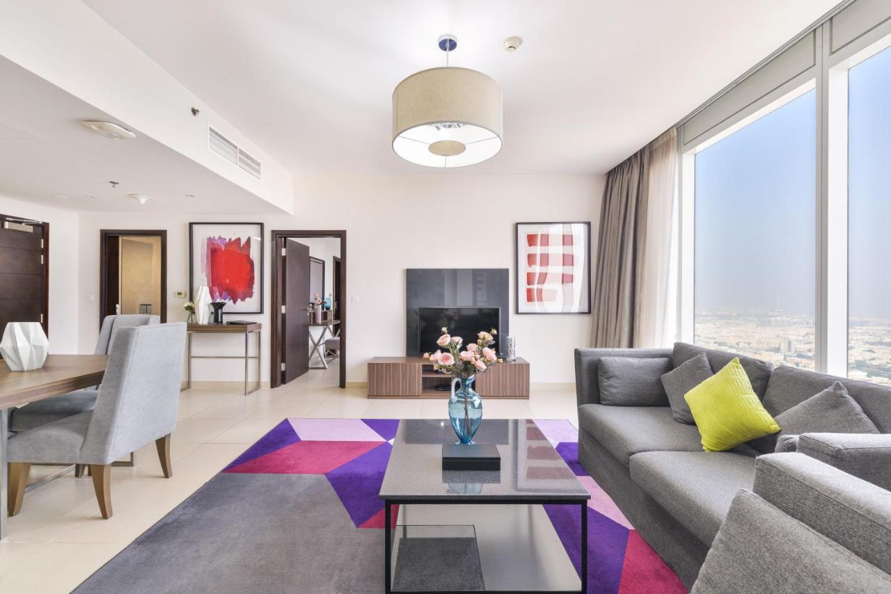 Nassima Tower Hotel Apartments Dubai Exterior foto A living room in a serviced apartment in Dubai