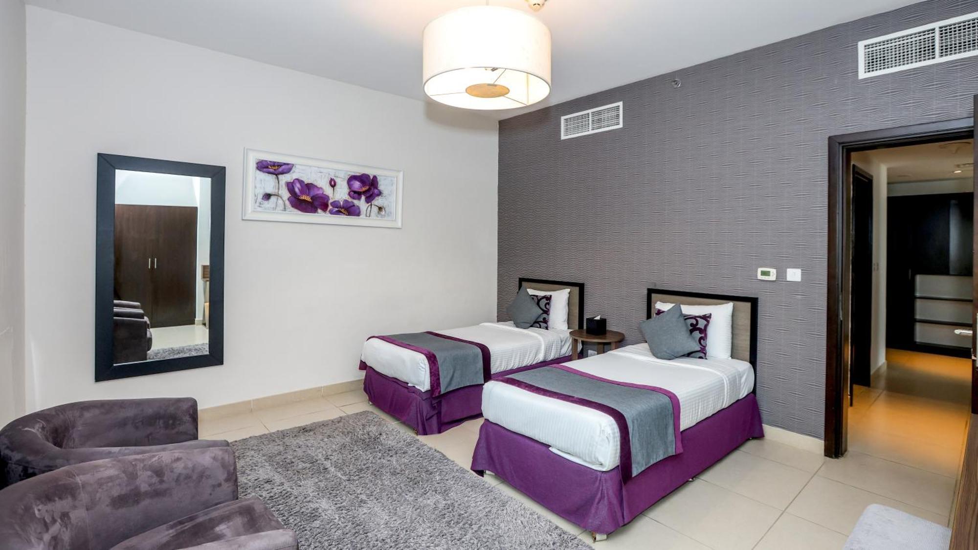 Nassima Tower Hotel Apartments Dubai Exterior foto A bedroom with two single beds